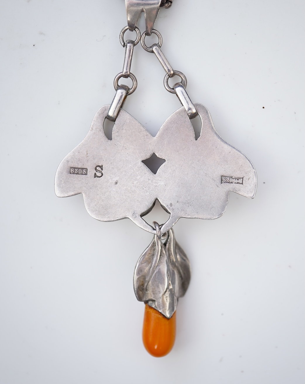 An Arts & Crafts silver and amber necklace, Denmark or Norway, mid 20th century